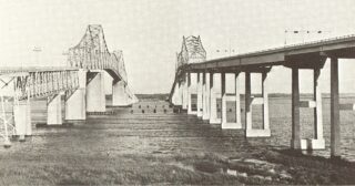 The Silas N. Pearman Bridge (right), spanning the Cooper River alongside the Grace Memorial Bridge, opened to traffic on April 29, 1966.